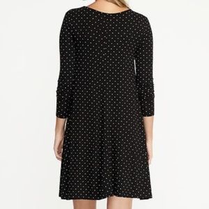 navy polka dot swing dress